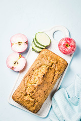Zucchini apple loaf cake. Top view, space for text.