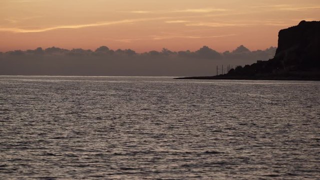 Sky after sunset over sea water surface, Greece Peloponnese