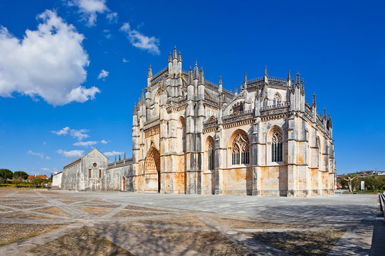 Batalha, Portugal. Monastery of Batalha aka Santa Maria da Vitoria Abbey. Facade with Portal in Gothic and Manuelino aka Manueline style