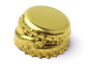  Stack of golden bottle caps