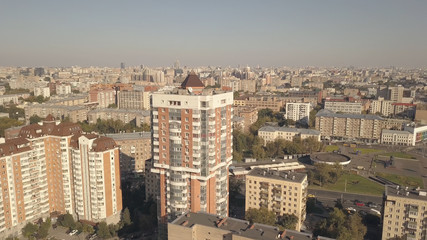 Obraz premium Panoramic view residential building in city. City building and moving car road