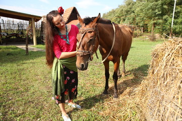 gypsy woman with her horse