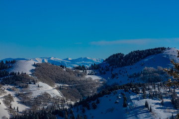 Fototapeta na wymiar Snowy Mountain Landscape On A Bright Sunny Day