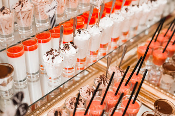 Different kinds of baked sweets on a buffet