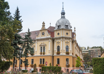 Fototapeta na wymiar Building of Metropolitan Agency near to the Old Town of Brasov in Romania