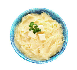 Bowl with tasty mashed potatoes on white background, top view