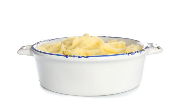 Casserole pot with tasty mashed potatoes on white background