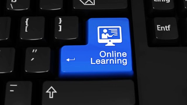 56. Online Learning Rotation Motion On Blue Enter Button On Modern Computer Keyboard with Text and icon Labeled. Selected Focus Key is Pressing Animation. Online Technology Concept