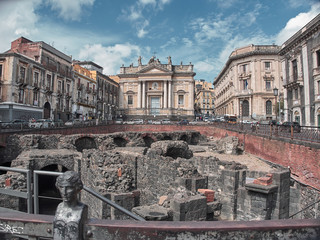 Shot of the Roman Anphitheater in Piazza Stesicoro in Catania in a summer day. Catania, Sicily