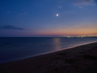 Fototapeta na wymiar Long exposure at Granelli beach at night during summer. Sicily, Italy