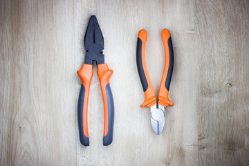 Combination pliers, cutting pliers and gripping pliers.