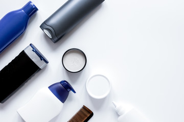 cosmetics for men in bottle on white background top view
