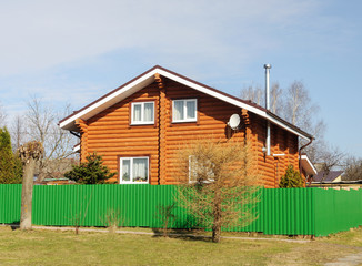 Obraz premium New wooden house, spring time
