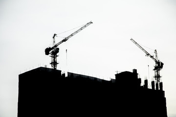 city silhouette building construction black and white background