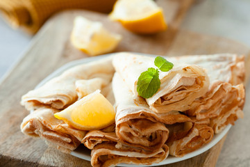 Lemon crepes on the plate
