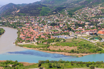 Aerial view on old town Mtskheta and confluence of the rivers Kura and Aragvi in Georgia