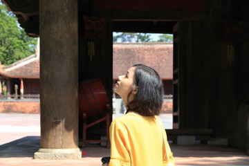woman traveling to Lam Kinh palace in Thanh Hoa, Vietnam
