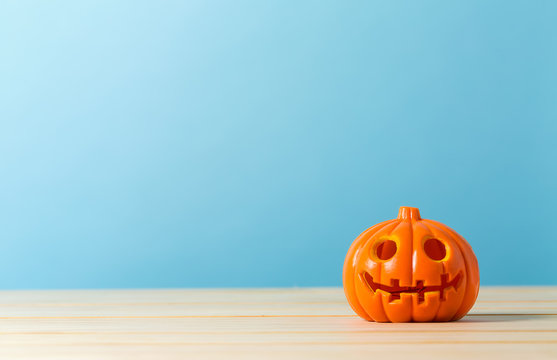 Halloween pumpkin lantern on a blue background