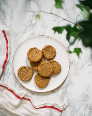 Gluten free cookie with buckwheat, corn and rice flour on white marble background