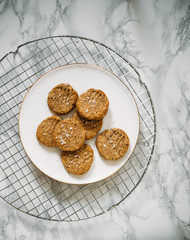 Gluten free cookie with buckwheat, corn and rice flour on white marble background