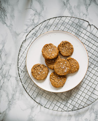 Gluten free cookie with buckwheat, corn and rice flour on white marble background