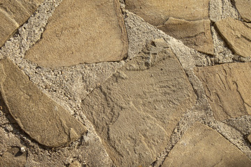 Floor from paving stones, irregular natural stones. Abstract background, texture image