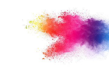 Red powder explosion on white background. Colored cloud. Colorful dust explode. Paint Holi.