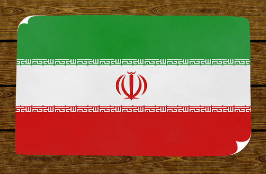 Illustration of an Iranian flag on the papier pasted on the woody wall