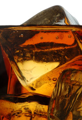 Ice cubes in whiskey - closeup