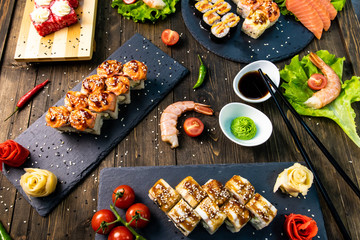 Wonderful sushi set, oriental theme on the old wooden table