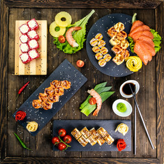 Wonderful sushi set, oriental theme on the old wooden table