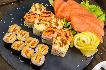 Wonderful sushi set, oriental theme on the old wooden table