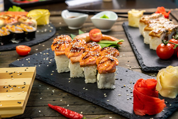 Wonderful sushi set, oriental theme on the old wooden table