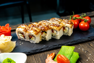 Wonderful sushi set, oriental theme on the old wooden table