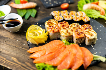 Wonderful sushi set, oriental theme on the old wooden table