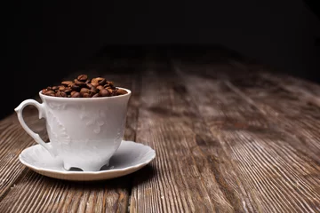 Fototapete Rund Cafe Coffee cup filled with coffee beans  © Богдан Якуба