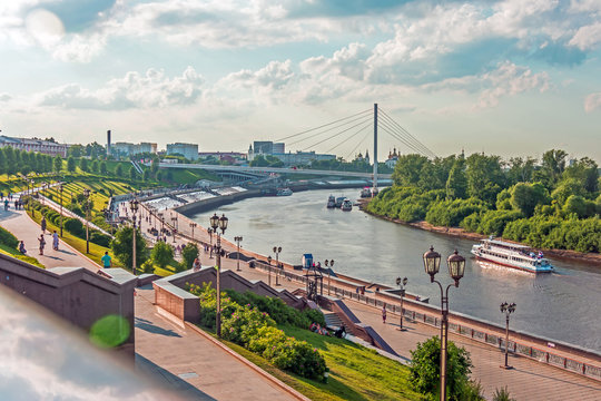 Embankment of the river with stairs and street lights at the summer.
