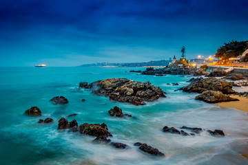 Beautiful view of Pacific rocky coast in Vina del Mar of waves hitting the rocks in Chile