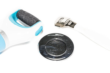 pedicure tools in the white wash basin