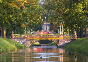 Cross bridge in fall in Alexander park, Pushkin, Saint Petersburg, Russia