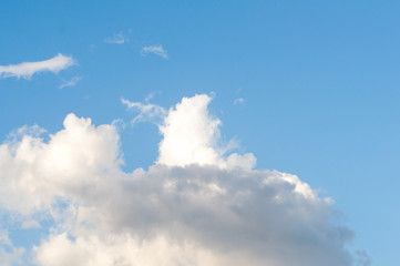 Image of clear blue sky and white clouds on day time for background usage.