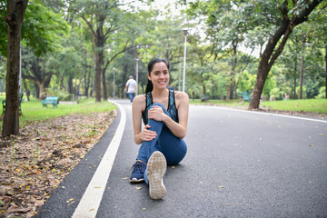 Exercise concept. Beautiful girl is stretching her muscles. Beautiful girls are warming up before...