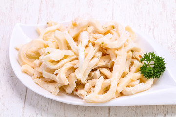 Marinated squid served parsley