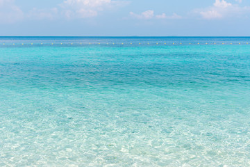 Beautiful white sand on Tropical beach blue water and blue sky