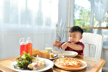 Boys are bread With breakfast At his home