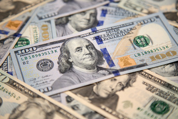 Close up of new hundred dollar bill with portrait of Franklin