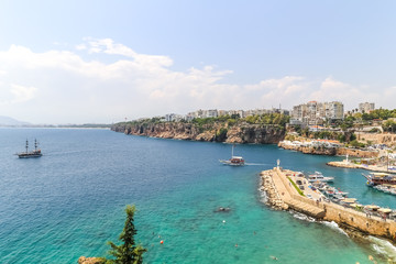 Naklejka na ściany i meble travel background with old harbour in Antalya