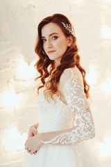 Fototapeta premium beautiful bride in a chic wedding dress