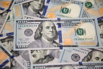 Close up of new hundred dollar bill with portrait of Franklin