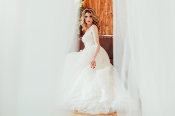 Fototapeta premium beautiful bride in a chic wedding dress